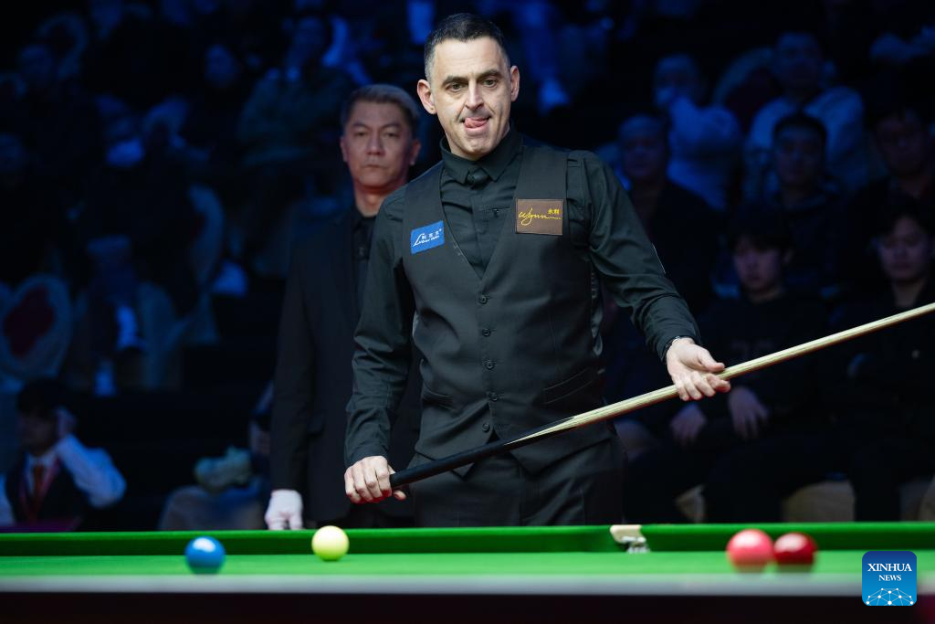 In pics exhibition game at 2023 Macau Snooker MastersXinhua