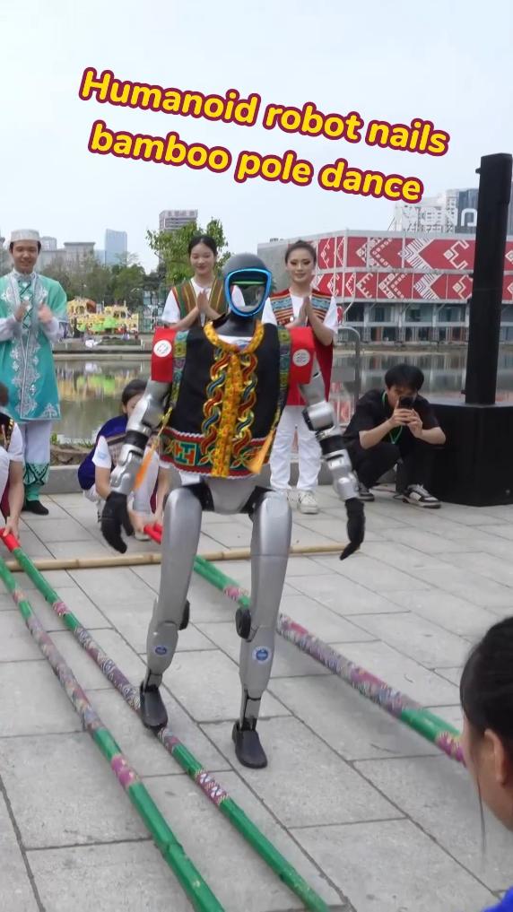 Humanoid robot nails bamboo pole dance