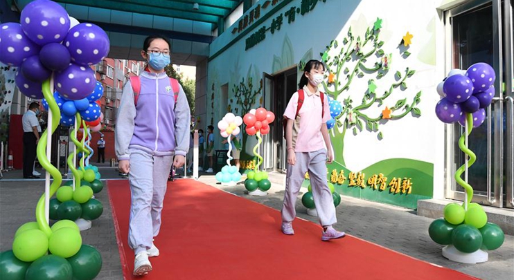 Students return to school in Beijing