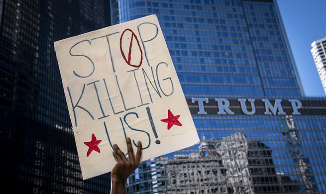 Demonstrators clash with police during protest over death of George Floyd in Chicago