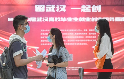 Wuhan holds first offline job fair since virus outbreak