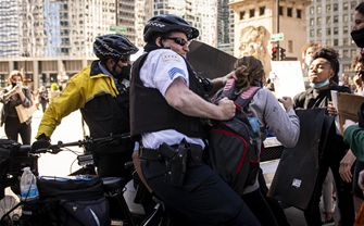 Demonstrators clash with police during protest over death of George Floyd in Chicago